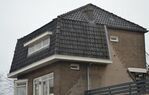 De zijkant, met de indruk die het gesloopte buurhuis heeft achtergelaten
<br/>
Richard Keijzer, 2014-12-18